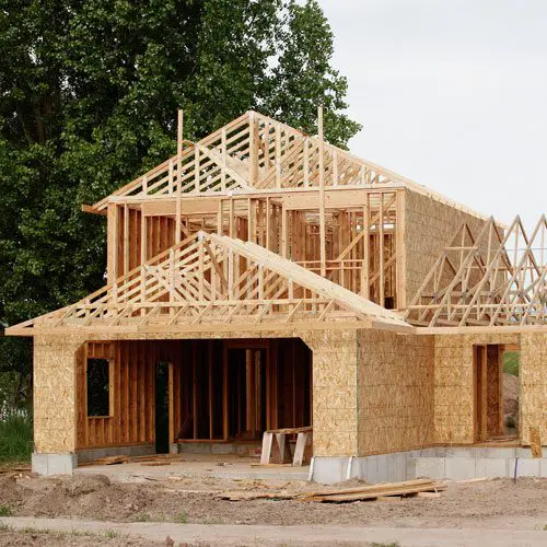 A house being built with wood framing.